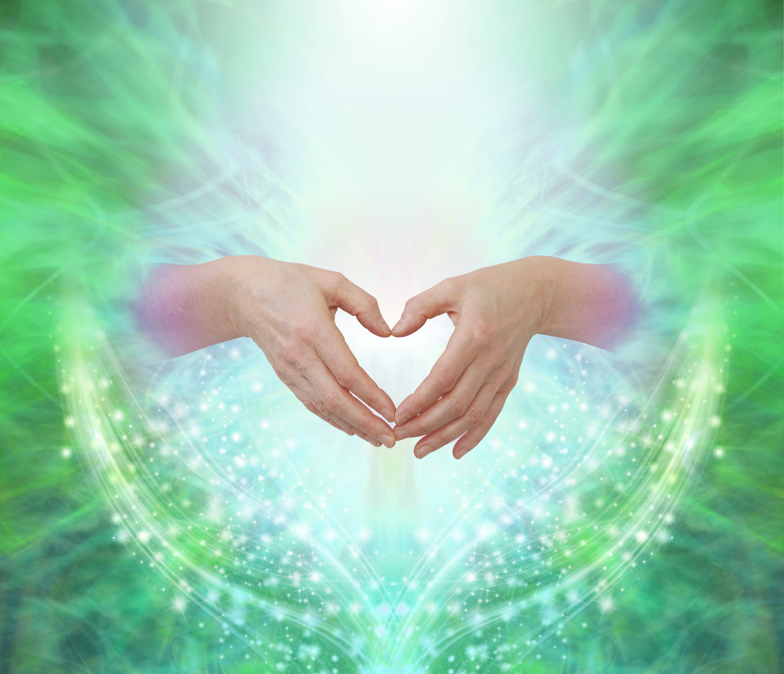 Hands forming a heart, symbolizing care and healing